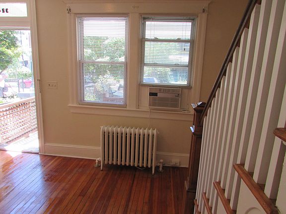 Radiant heat throughout; cooled with window units.