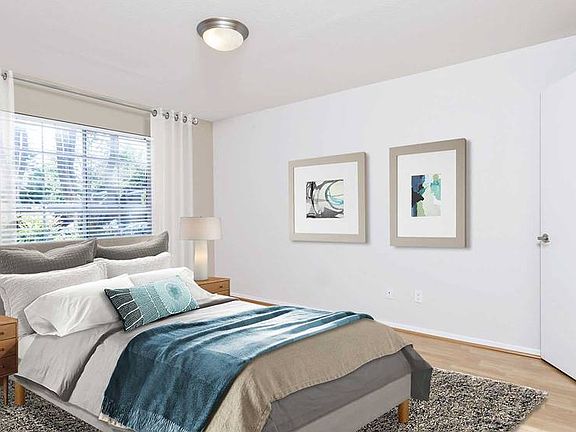 Bedroom with hard surface flooring