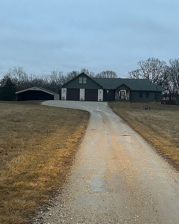 Front of home and driveway 