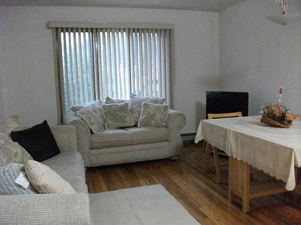 living room/dining combo now has fan not shown in photo full
