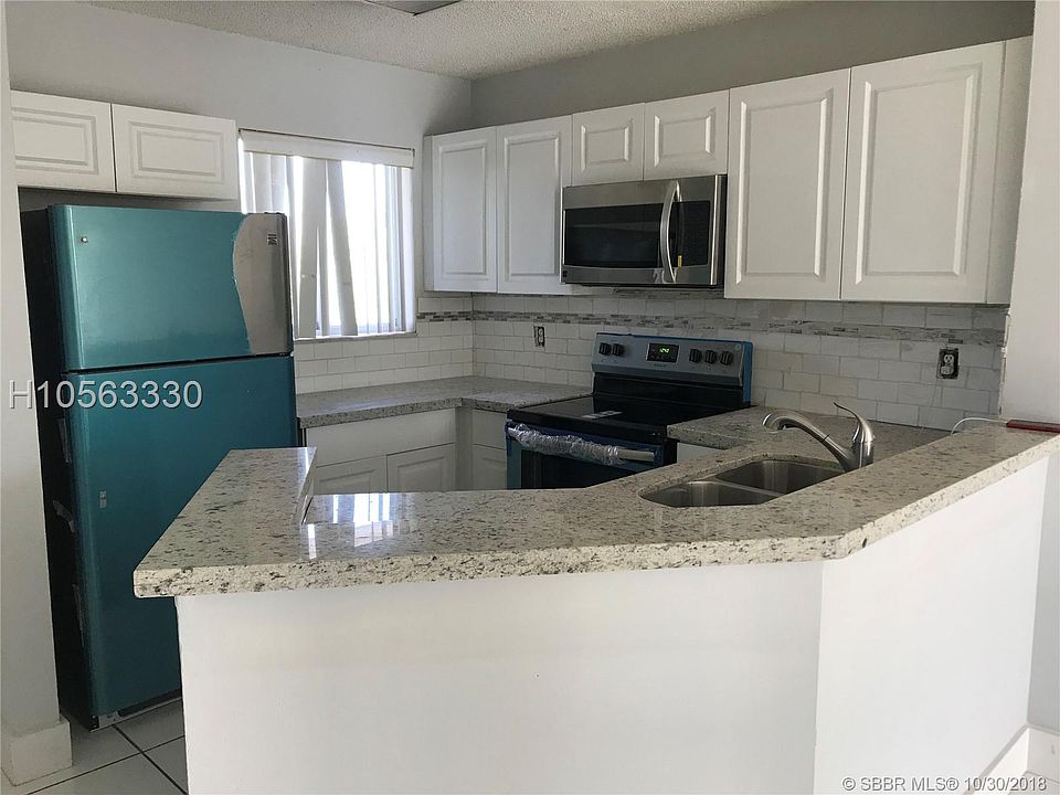 1st image of 8750 N Sherman Cir APT 408