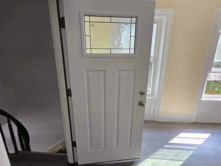 Unit entrance + living room