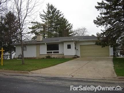 Front of house
						:
						2 garage with extra spot for 2 motorcycles, Partially finished basement