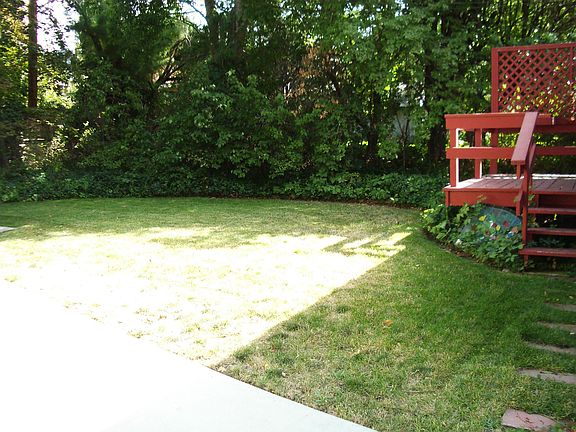 Private deck and fenced backyard