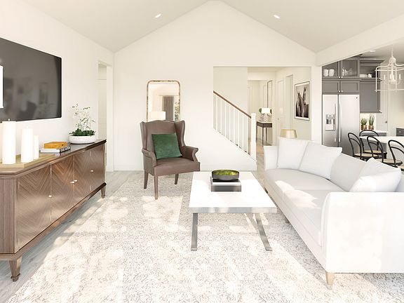 Great room adjacent to kitchen and dining area