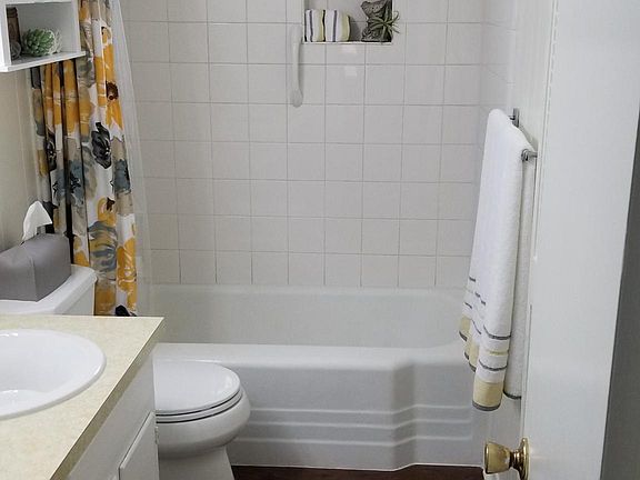 Bathroom with lots of room, cabinets and drawers also freshly lined.