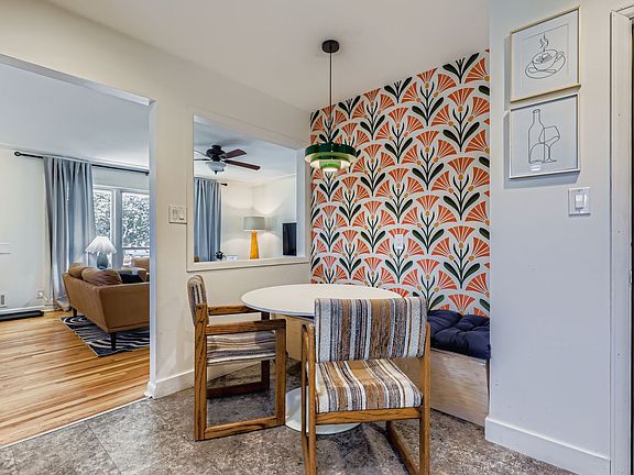 Main level breakfast nook with bench seating and chairs