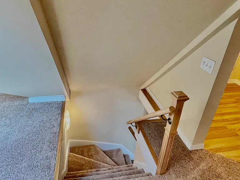 Stairs down from finished attic.