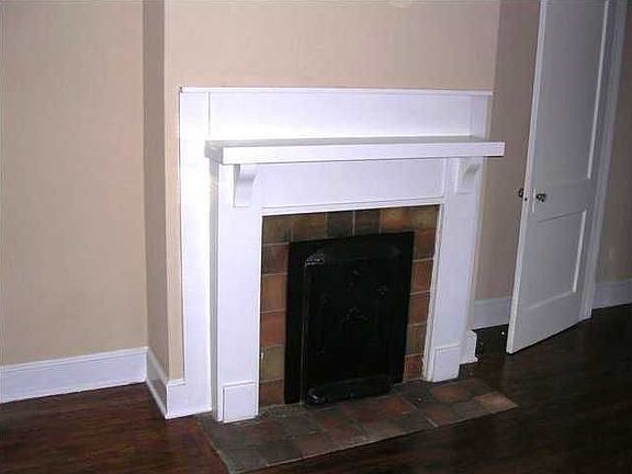 Guest bedroom with fireplace/mantle