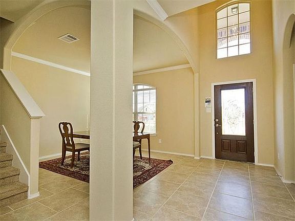 Entryway with high ceilings