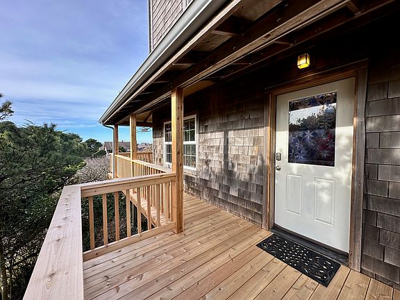 Front porch entryway off private driveway