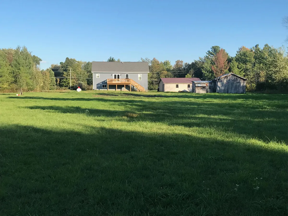Back view of house and lawn - 39859 Hyde Lake Rd
