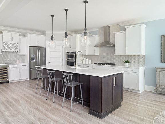 The open floorplan allows for additional seating space.