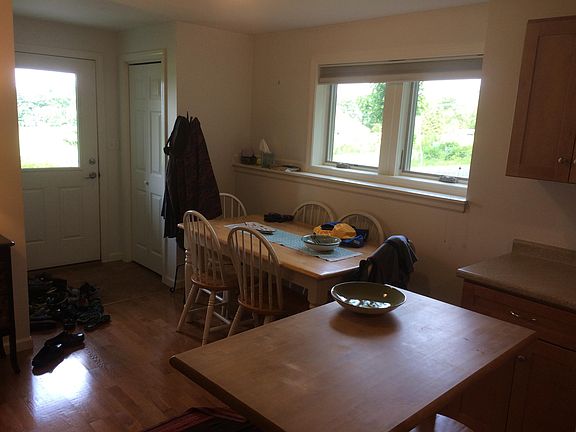 Entrance, north windows, eating area.