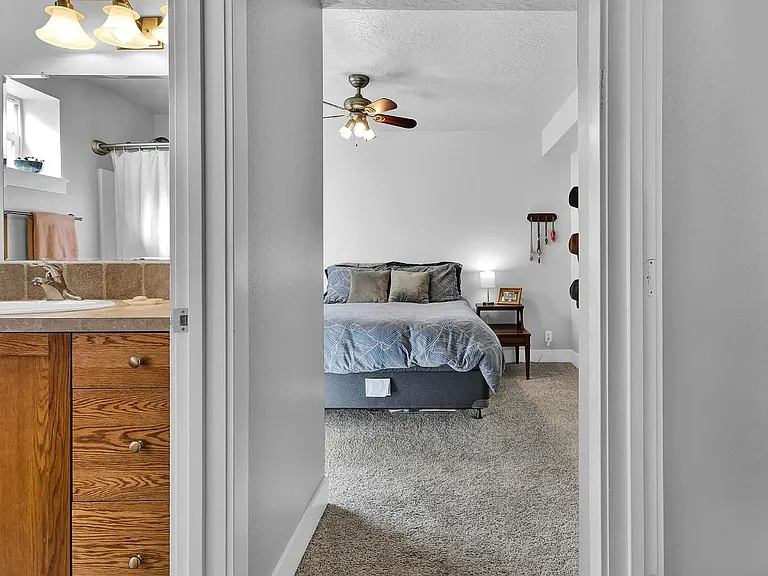 Master suite, bath and closet (off to right). View from the hall way.