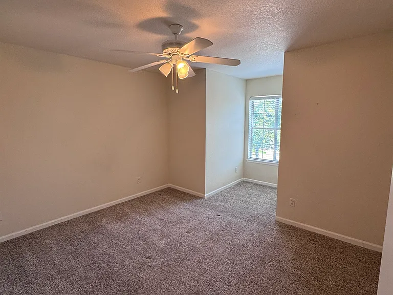 Upstairs, Bedroom #2, with sunny nook and walk in closet
