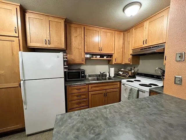 Kitchen with real Alder Wood cabinetry. Lots and lots of cabinet space!!