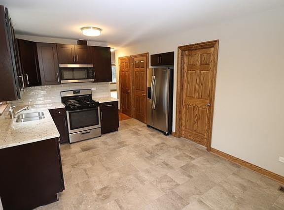 2nd image of 9329 S Kolmar Ave