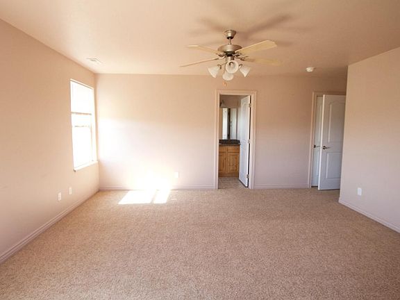 Large Master Bedroom with walk in closets and a master bath