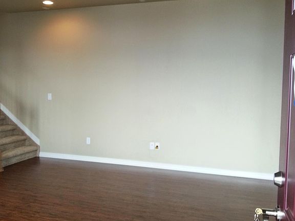 Large open living room with lots of natural light