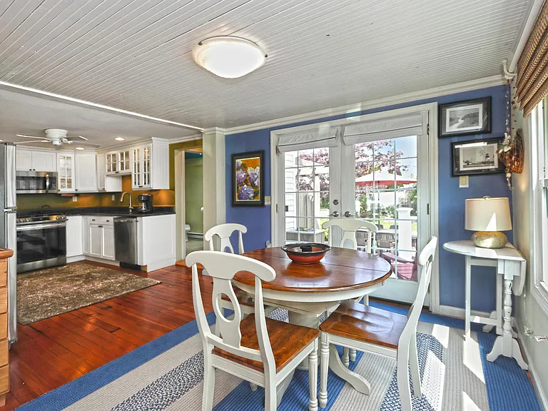 Dining area with french doors to yard.