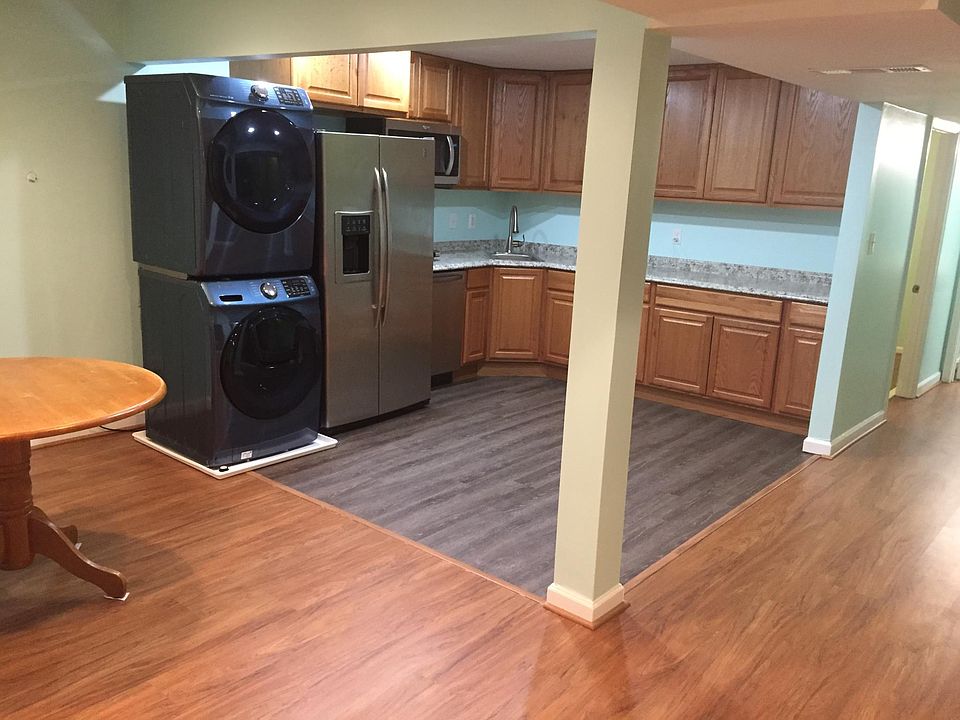 Kitchenette with Refrigerator, Dishwasher, Microwave, Washer, Dryer and 2 burner electric cooktop.