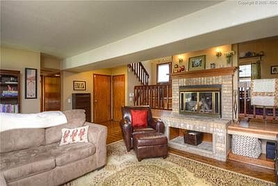 Family Room with fireplace, built in storage for games, blankets, etc.