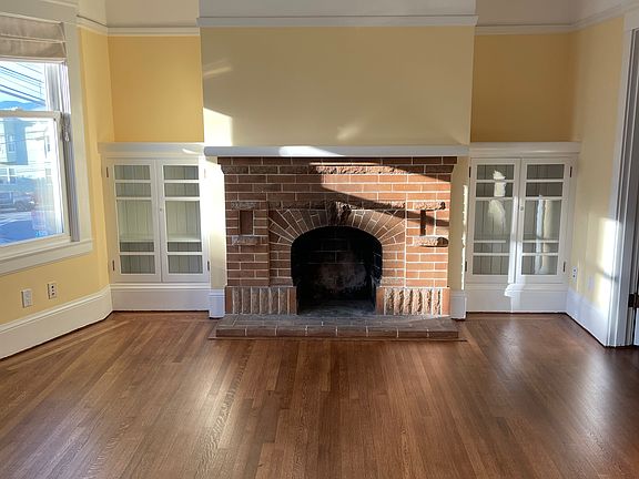 Living room with decorative fireplace