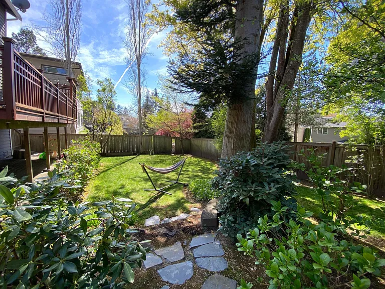 Huge, well maintained yard with fruit trees, with custom landscaping