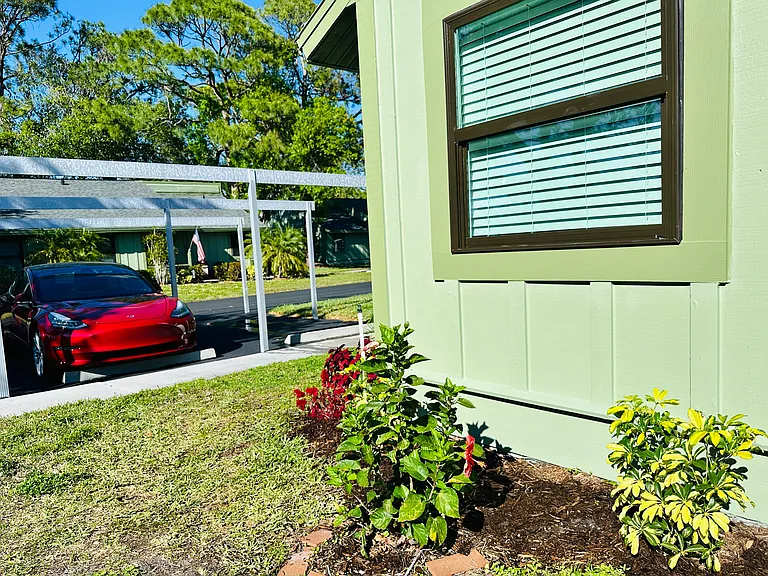 New hurricane windows. Carport covered parking space. Nice landscaping.