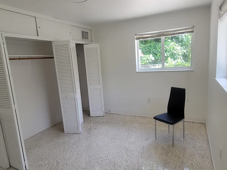Bedroom with extra wall to wall closet, aside from walk-in closet