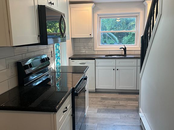 Kitchen view from entrance way; new flooring