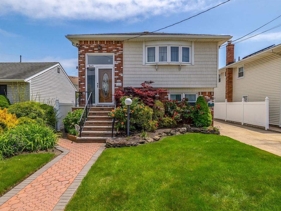 Beautifully landscaped 2 family home