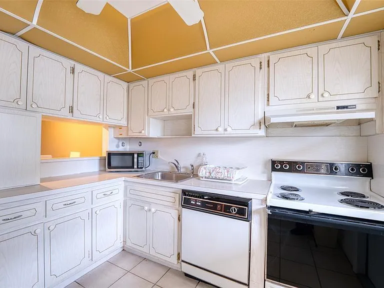 4700 Washington St #105 — Photo 3
