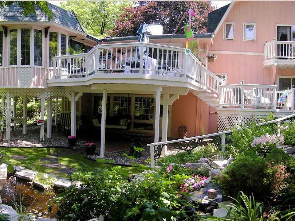 'Gardener's Dream' yard w/mature perennial gardens, Koi pond & waterfall! WOW!