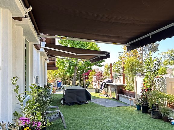 retractable awnings, create an exterior room.