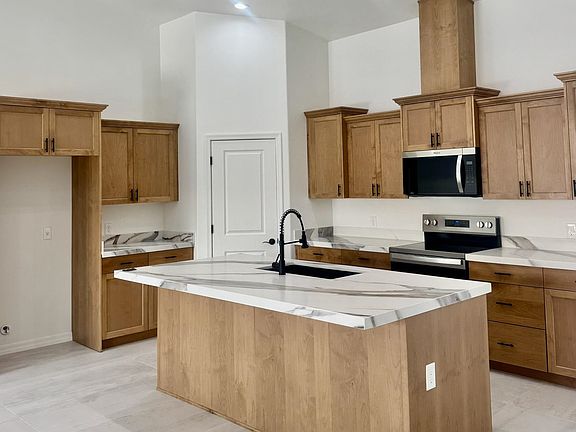 2nd image of 12683 E 51st St