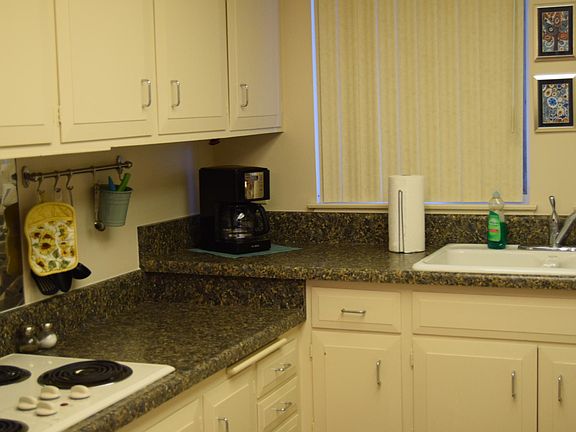Kitchen with stove top.