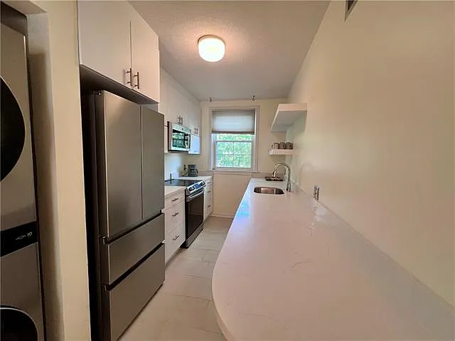 7444 Saint Charles Ave #202 — Photo 20