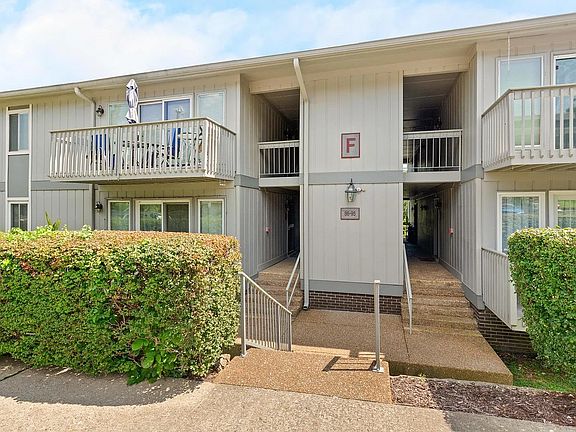 Front of building. Unit is to the left down the hallway. Essentially a ground level unit.