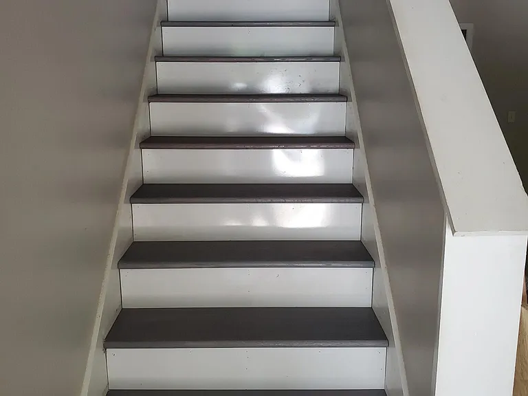 Hardwood stairs lead to two Large Bedrooms plus bath. Bedroom can accommodate up to a King size bedroom suite.
