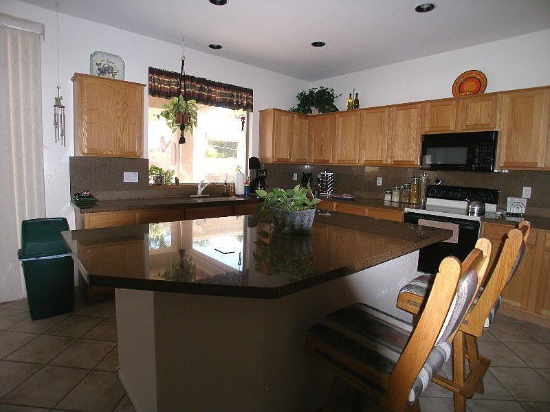 Granite Countertops, Kitchen Island, Pantry, Recessed Lighting