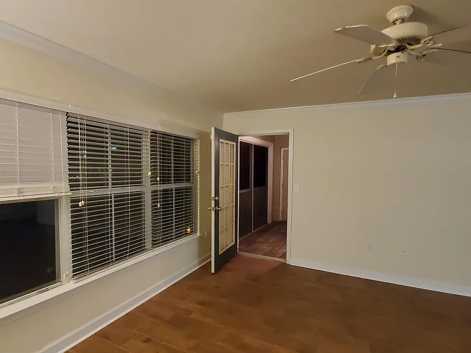 Living Room opens to screened patio.