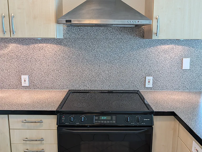 Stove with hood.