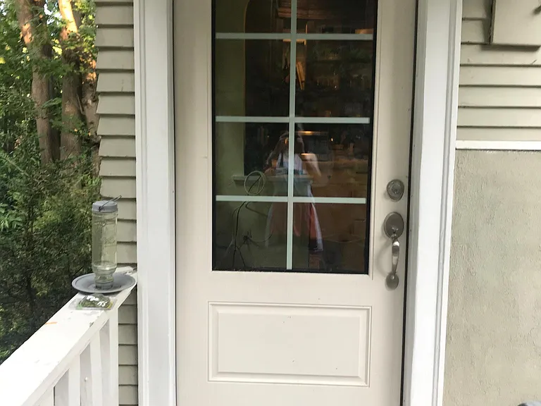 The back door in the kitchen leads to a patio.