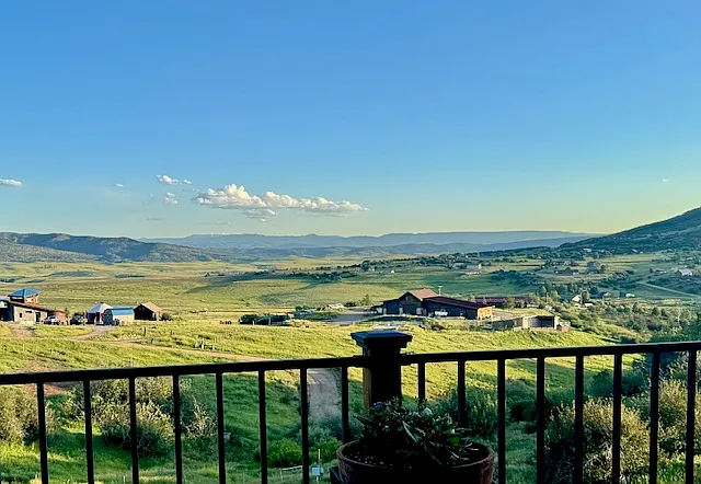 View of Flattops Mountain Range from Southside of wraparound deck.