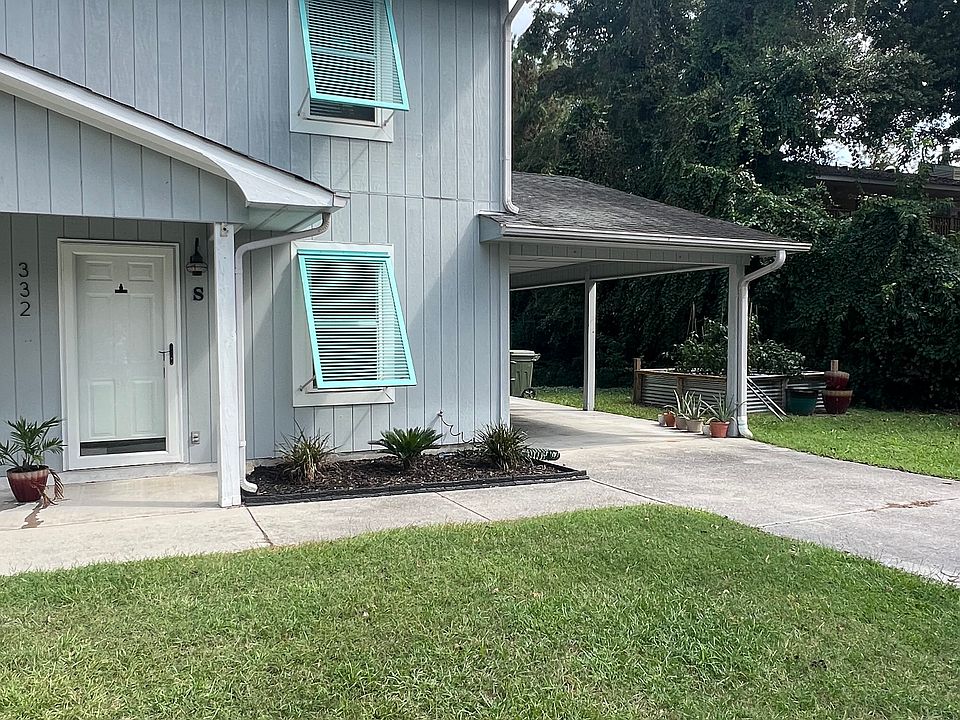 South unit to be rented, drive way and car port.