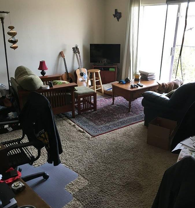 Living room, a step in front of closet depicted in image 7