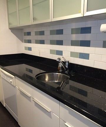 Updated counter, backsplash and cabinets