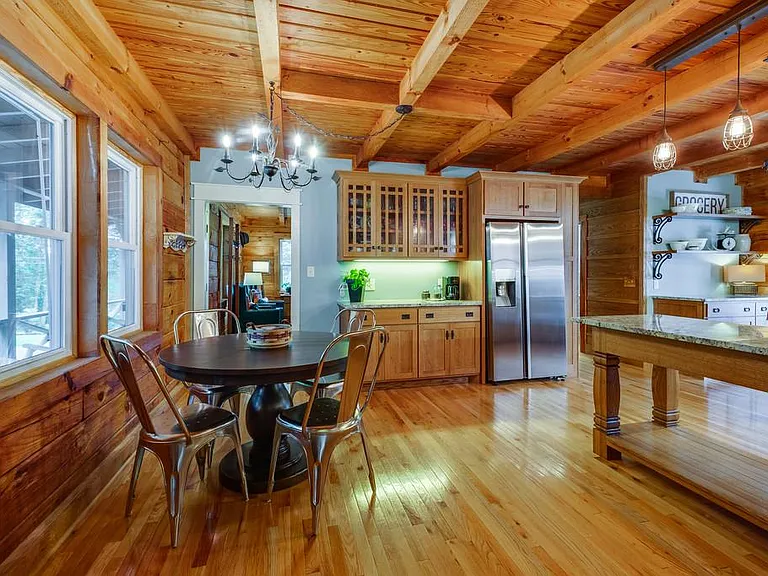 Another view of the kitchen and breakfast table.
